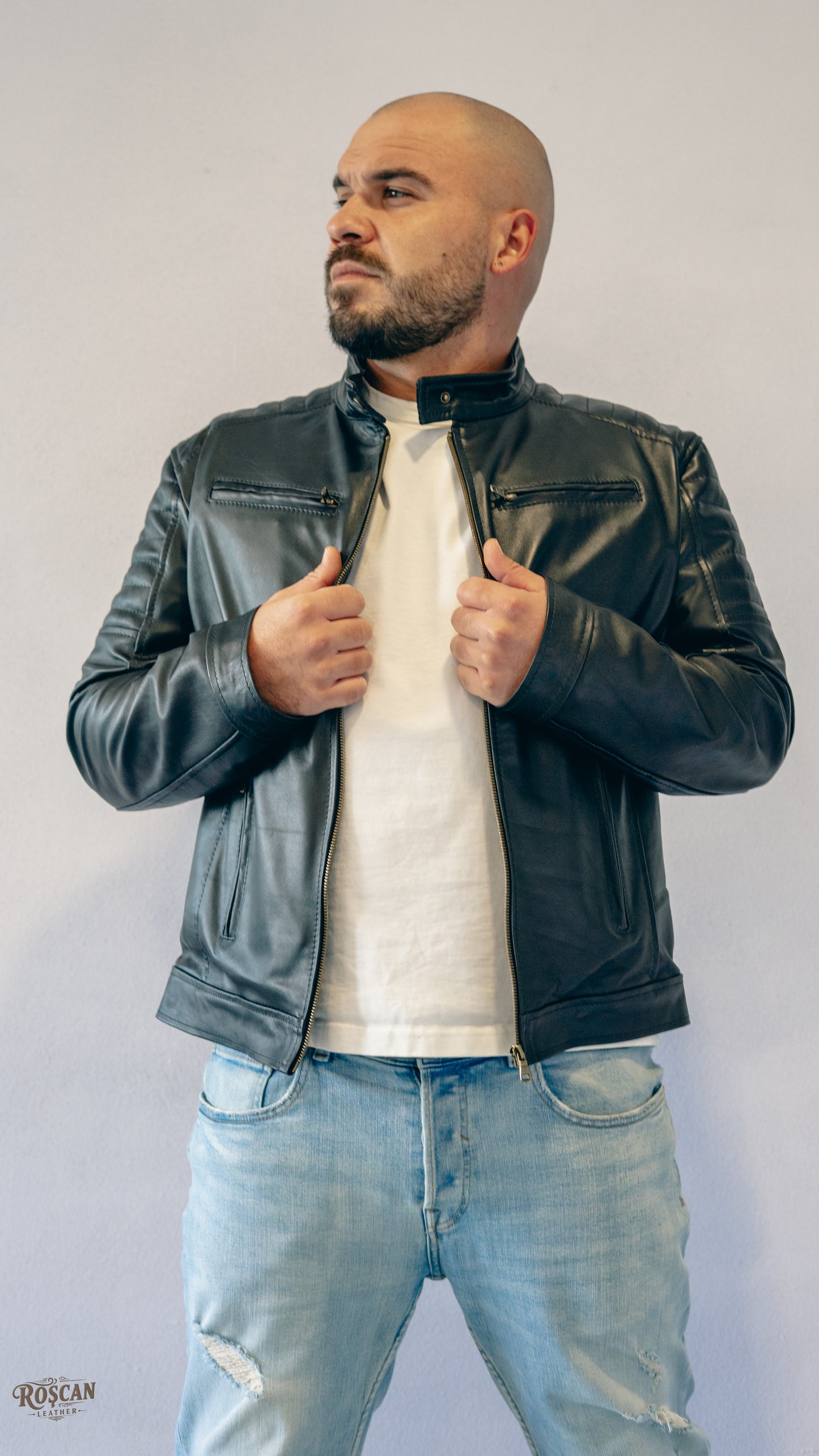 Giacca uomo in pelle nera con zip e tasche verticali