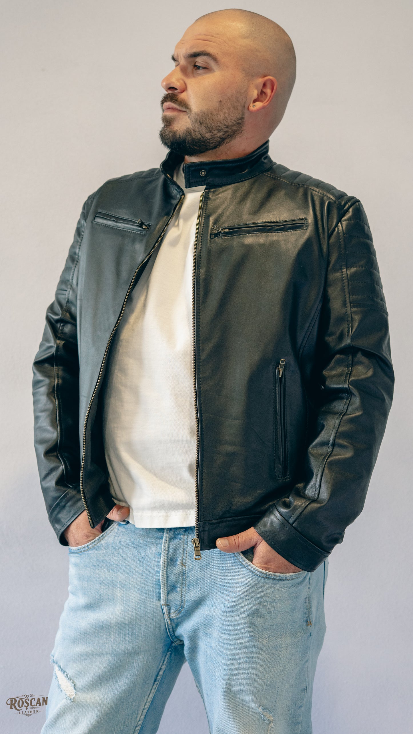 Giacca uomo in pelle nera con zip e tasche verticali