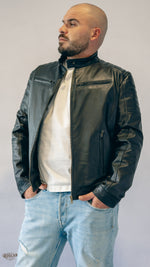 Giacca uomo in pelle nera con zip e spalle trapuntate